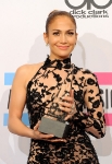 LOS ANGELES, CA - NOVEMBER 20:  Singer Jennifer Lopez, winner of Favorite Latin Artist Award, poses in the press room at the 2011 American Music Awards held at Nokia Theatre L.A. LIVE on November 20, 2011 in Los Angeles, California.  (Photo by Jason Merritt/Getty Images) *** Local Caption *** Jennifer Lopez;
