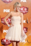 LAS VEGAS, NV - DECEMBER 05: Singer Carrie Underwood arrives at the American Country Awards 2011 at the MGM Grand Garden Arena on December 5, 2011 in Las Vegas, Nevada. (Photo by Frazer Harrison/Getty Images) *** Local Caption *** Carrie Underwood;