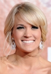 LAS VEGAS, NV - DECEMBER 05: Singer Carrie Underwood arrives at the American Country Awards 2011 at the MGM Grand Garden Arena on December 5, 2011 in Las Vegas, Nevada. (Photo by Frazer Harrison/Getty Images) *** Local Caption *** Carrie Underwood;