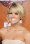LAS VEGAS, NV - DECEMBER 05: Singer Carrie Underwood arrives at the American Country Awards 2011 at the MGM Grand Garden Arena on December 5, 2011 in Las Vegas, Nevada. (Photo by Frazer Harrison/Getty Images) *** Local Caption *** Carrie Underwood;