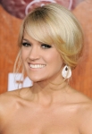 LAS VEGAS, NV - DECEMBER 05: Singer Carrie Underwood arrives at the American Country Awards 2011 at the MGM Grand Garden Arena on December 5, 2011 in Las Vegas, Nevada. (Photo by Frazer Harrison/Getty Images) *** Local Caption *** Carrie Underwood;
