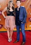 LAS VEGAS, NV - DECEMBER 05: (L) Singer Lauren Alaina and 2011 American Idol Scotty McCreery arrives at 2011 American Country Awards at MGM Grand Garden Arena on December 5, 2011 in Las Vegas, Nevada. (Photo by Denise Truscello/WireImage) *** Local Caption *** Lauren Alaina;Scotty McCreery;