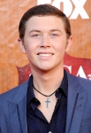 LAS VEGAS, NV - DECEMBER 05: 2011 American Idol Scotty McCreery arrives at the American Country Awards 2011 at the MGM Grand Garden Arena on December 5, 2011 in Las Vegas, Nevada. (Photo by Frazer Harrison/Getty Images) *** Local Caption *** Scotty McCreery;
