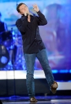 LAS VEGAS, NV - DECEMBER 05: Musician Scotty McCreery performs onstage at the American Country Awards 2011 at the MGM Grand Garden Arena on December 5, 2011 in Las Vegas, Nevada. (Photo by Ethan Miller/Getty Images) *** Local Caption *** Scotty McCreery;