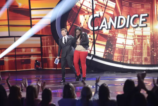 AMERICAN IDOL:Candice Glover (R) makes it to the final 10 on AMERICAN IDOL airing Thursday, March 7 (8:00-9:30 PM ET/PT) on FOX. Also pictured: Ryan Seacrest. CR: Michael Becker / FOX. Copyright: FOX.