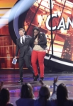 AMERICAN IDOL:Candice Glover (R) makes it to the final 10 on AMERICAN IDOL airing Thursday, March 7 (8:00-9:30 PM ET/PT) on FOX. Also pictured: Ryan Seacrest. CR: Michael Becker / FOX. Copyright: FOX.