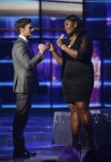 AMERICAN IDOL: L-R: Ryan Seacrest and Candice Glover on AMERICAN IDOL Wednesday, May 1 (8:00-10:00 PM ET/PT) on FOX. CR: Michael Becker/ FOX. Copyright: FOX.