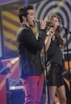 AMERICAN IDOL: L-R: Lazaro Arbos and Angie Miller perform together on AMERICAN IDOL Wednesday, April 3 (8:00-10:00 PM ET/PT) on FOX. CR: Michael Becker / FOX. Copyright: FOX.