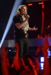 AMERICAN IDOL XIII: Caleb Johnson performs on AMERICAN IDOL XIII airing Wednesday, May 14 (8:00-10:00 PM ET / PT) on FOX. CR: Michael Becker / FOX. Copyright 2014 / FOX Broadcasting. Also Pictured: Jennifer Lopez (R).