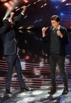 AMERICAN IDOL XIII: L-R: Host Ryan Seacrest and saved contestant Sam Woolf on AMERICAN IDOL XIII airing Thursday, April 3 (9:00-9:30 PM ET / PT) on FOX. CR: Frank Micelotta / FOX. Copyright 2014 / FOX Broadcasting.