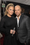 LOS ANGELES, CA - NOVEMBER 20: Musician Chris Daughtry (R) and Deanna Daughtry arrive at the 2011 American Music Awards held at Nokia Theatre L.A. LIVE on November 20, 2011 in Los Angeles, California. (Photo by John Shearer/AMA2011/Getty Images for AMA) *** Local Caption *** Deanna Daughtry;Chris Daughtry;