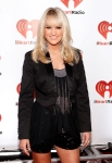 poses in the press room at the iHeartRadio Music Festival held at the MGM Grand Garden Arena on September 23, 2011 in Las Vegas, Nevada.