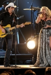 NASHVILLE, TN - NOVEMBER 09: Brad Paisley and Carrie Underwood perform onstage at the 45th annual CMA Awards at the Bridgestone Arena on November 9, 2011 in Nashville, Tennessee. (Photo by Jason Kempin/WireImage) *** Local Caption *** Brad Paisley;Carrie Underwood;