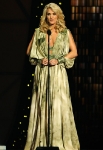 NASHVILLE, TN - NOVEMBER 09: Co host Carrie Underwood speaks onstage at the 45th annual CMA Awards at the Bridgestone Arena on November 9, 2011 in Nashville, Tennessee. (Photo by Rick Diamond/Getty Images) *** Local Caption *** Carrie Underwood;