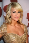 NASHVILLE, TN - NOVEMBER 09: Co host Carrie Underwood attends the 45th annual CMA Awards at the Bridgestone Arena on November 9, 2011 in Nashville, Tennessee. (Photo by Michael Loccisano/Getty Images) *** Local Caption *** Carrie Underwood;
