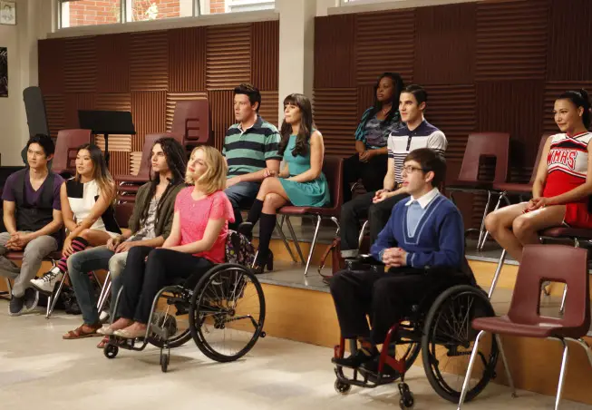 GLEE: The glee club watches a performance in the "Dance With Somebody" episode of GLEE airing Tuesday, April 24 (8:00-9:00 PM ET/PT) on FOX. PIctured L-R front row: Harry Shum Jr., Jenna Ushkowitz, Samuel Larsen, Dianna Agron and Kevin McHale. Back row L-R: Cory Monteith, Lea Michele, Amber Riley, Darren Criss and Naya Rivera. ©2012 Fox Broadcasting Co. Cr: Beth Dubber/FOX