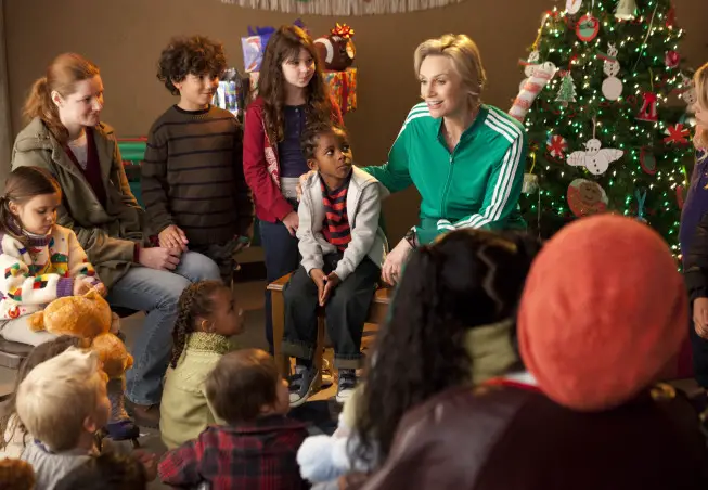 GLEE: Sue (Jane Lynch, R) volunteers at a children's homeless shelter in the "Extraordinary Merry Christmas" episode of GLEE airing Tuesday, Dec. 13 (8:00-9:00 PM ET/PT) on FOX. ©2011 Fox Broadcasting Co. Cr: Adam Rose/FOX