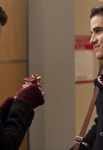GLEE: Blaine (Darren Criss, R) gives Kurt (Chris Colfer, L) a gift in the "Extraordinary Merry Christmas" episode of GLEE airing Tuesday, Dec. 13 (8:00-9:00 PM ET/PT) on FOX. ©2011 Fox Broadcasting Co. Cr: Adam Rose/FOX
