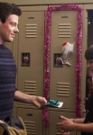 GLEE: Finn (Cory Monteith, L) gives Rachel (Lea Michele, R) a gift in the "Extraordinary Merry Christmas" episode of GLEE airing Tuesday, Dec. 13 (8:00-9:00 PM ET/PT) on FOX. ©2011 Fox Broadcasting Co. Cr: Adam Rose/FOX