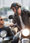 GLEE: Puck (Mark Salling, R) invites his brother Jake (Jacob Artist, L) to Los Angeles in the "Glee, Actually" episode of GLEE airing Thursday, Dec. 13 (9:00-10:00 PM ET/PT) on FOX. Â©2012 Fox Broadcasting Co. CR: Eddy Chen/FOX