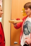 GLEE: Brittany (Heather Morris, L) passes out gifts in the "Glee, Actually" episode of GLEE airing Thursday, Dec. 13 (9:00-10:00 PM ET/PT) on FOX. Also Pictured: Blake Jenner. ©2012 Fox Broadcasting Co. CR: Eddy Chen/FOX