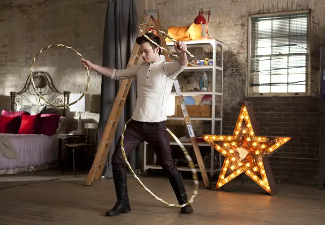 GLEE: Kurt (Chris Colfer) dances with hula hoops in the "Guilty Pleasure" episode of GLEE airing Thursday, March 21 (9:00-10:00 PM ET/PT) on FOX. Â©2013 Fox Broadcasting Co. Cr: Adam Rose/FOX