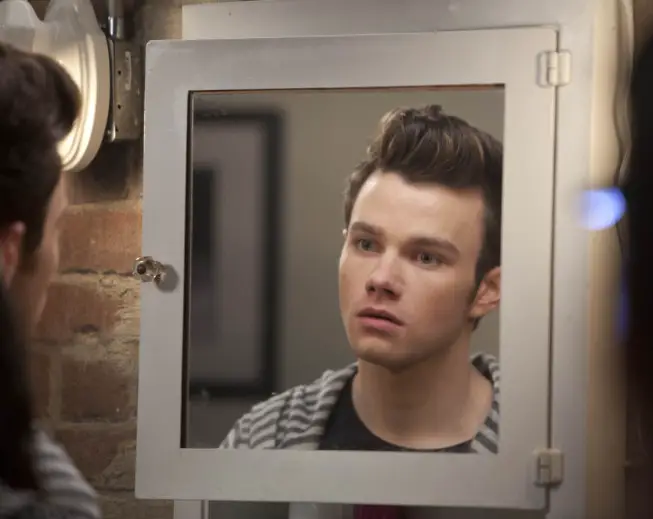 GLEE: Kurt (Chris Colfer) checks himself out in the "Guilty Pleasures" episode of GLEE airing Thursday, March 21 (9:00-10:00 PM ET/PT) on FOX. ©2013 Fox Broadcasting Co. CR: Adam Rose/FOX