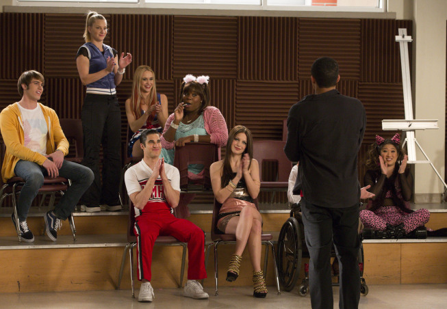 GLEE: Members of the glee club watch Jake (Jacob Artist (back toward camera) perform in the "Guilty Pleasures" episode of GLEE airing Thursday, March 21 (9:00-10:00 PM ET/PT) on FOX. Â©2013 Fox Broadcasting Co. Pictured L-R: Blake Jenner, Heather Morris, Becca Tobin, Darren Criss, Alex Newell, Melissa Benoist, Kevin McHale and Jenna Ushkowitz. CR: Jennifer Clasen/FOX