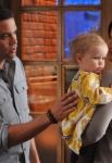 GLEE: Puck (Mark Salling, L) visits his daughter at Shelby's (guest star Idina Menzel, R) house in the "I Am Unicorn" episode of GLEE airing Tuesday, Sept. 27 (8:00-9:00 PM ET/PT) on FOX. Â©2011 Fox Broadcasting Co. Cr: Mike Yarish/FOX
