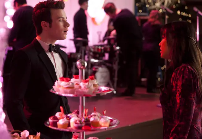 GLEE: Kurt (Chris Colfer, L) and Tina (Jenna Ushkowitz, R) chat at Will and Emma's wedding in the "I Do" episode of GLEE airing Thursday, Feb. 14 (9:00-10:00 PM ET/PT) on FOX. ©2013 Fox Broadcasting Co. CR: Adam Rose/FOX