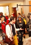 CR: Andrew Macpherson for TV Guide Magazine The Gleeks films a scene in the school hallway.