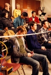 CR: Andrew Macpherson for TV Guide Magazine The glee club kids take their positions for a scene.