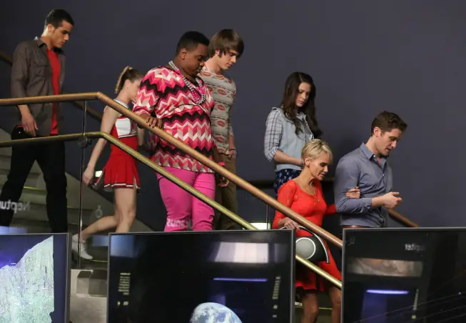 GLEE: Will (Matthew Morrison, R) and April Rhodes (guest star Kristin Chenoweth, red dress) take the kids to NAME in the "New Directions" episode of GLEE airing Tuesday, March 25 (9:00-10:00 PM ET/PT) on FOX. Â©2014 Broadcasting Co. CR: Mike Yarish/FOX