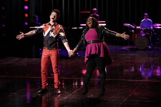 GLEE: Kurt (Chris Colfer, L) and Mercedes (Amber Riley, R) perform in the "New Directions" episode of GLEE airing Tuesday, March 25 (9:00-10:00 PM ET/PT) on FOX. Â©2014 Broadcasting Co. CR: Tyler Golden/FOX