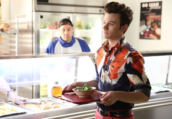 GLEE: Kurt (Chris Colfer) visits McKinley High in the "New Directions" episode of GLEE airing Tuesday, March 25 (9:00-10:00 PM ET/PT) on FOX. Â©2014 Broadcasting Co. CR: Tyler Golden/FOX