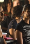 GLEE: Santana (Naya Rivera, L) and Rachel (Lea Michele, R) watch a performance in the "Trio" episode of GLEE airing Tuesday, March 4 (8:00-9:00 PM ET/PT) on FOX. ©2014 Fox Broadcasting Co. CR: Adam Rose/FOX