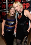 poses backstage at the iHeartRadio Music Festival held at the MGM Grand Garden Arena on September 23, 2011 in Las Vegas, Nevada.