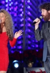 LOS ANGELES, CA - DECEMBER 02: Singers Haley Reinhart (L) and Casey Abrams perform at the 4th Annual Holiday Tree Lighting at L.A. LIVE on December 2, 2011 in Los Angeles, California. (Photo by Jesse Grant/WireImage) *** Local Caption *** Haley Reinhart;Casey Abrams;