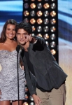 TEEN CHOICE 2012: Presenters Lea Michele and Tyler Posey during the TEEN CHOICE 2012, airing LIVE Sunday, July 22 (8:00-10:00 PM ET live/PT tape-delayed) on FOX at the Gibson Amphitheater, Universal City, CA. CR: Michael Yarish/FOX