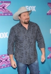 THE X FACTOR: Tate Stevens at THE X FACTOR Final Three Red Carpet and Press Conference, Monday, Dec. 17 in Los Angeles, CA. CR: Ray Mickshaw / FOX.