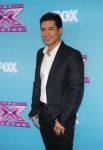 THE X FACTOR: Mario Lopez at THE X FACTOR Final Three Red Carpet and Press Conference, Monday, Dec. 17 in Los Angeles, CA. CR: Ray Mickshaw / FOX.