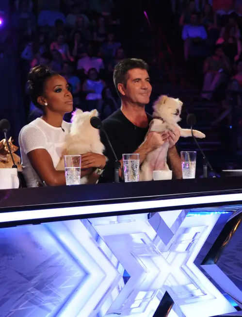 THE X FACTOR: June 11, 2013: L-R: Kelly Rowland and Simon Cowell judge contestants with a little help from their friends on the set of THE X FACTOR in New Orleans. THE X FACTOR airs this Fall on FOX. CR: Ray Mickshaw / FOX. Â© Copyright 2013 / FOX