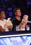 THE X FACTOR: June 11, 2013: L-R: Kelly Rowland and Simon Cowell judge contestants with a little help from their friends on the set of THE X FACTOR in New Orleans. THE X FACTOR airs this Fall on FOX. CR: Ray Mickshaw / FOX. Â© Copyright 2013 / FOX