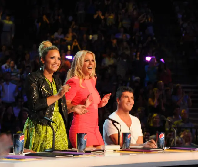 THE X FACTOR: L-R: Demi Lovato, Britney Spears and Simon Cowell on the set of THE X FACTOR airing on FOX. CR: Ray Mickshaw / FOX.