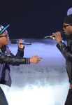 THE X FACTOR: Finale: Astro (L) and 50 Cent (R) perform on THE X FACTOR Dec. 22 (8:00-10:00 PM ET/PT) on FOX. THE X FACTOR Finale airs Wed., Dec. 21 and Thurs., Dec. 22 on FOX. CR: Ray Mickshaw / FOX.