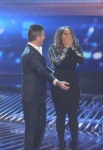 THE X FACTOR: Finale: Judge Simon Cowell (L) reacts as Melanie Amaro (R) is announed winner of THE X FACTOR Dec. 22 (8:00-10:00 PM ET/PT) on FOX. THE X FACTOR Finale airs Wed., Dec. 21 and Thurs., Dec. 22 on FOX. CR: Ray Mickshaw / FOX.
