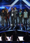 THE X FACTOR: Top 10 to 9 Elimination: Host Steve Jones (C) and the top 10 contestants stand before the judges on THE X FACTOR airing Thursday, Nov. 17 (8:00-9:00 PM ET/PT) on FOX. CR: Ray Mickshaw / FOX.