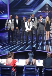 THE X FACTOR: Host Steve Jones (center) with groups Stereo Hogzz (L) and Lakoda Rany (R) on THE X FACTOR airing onThursday, Nov. 10 (8:00-9:00 PM ET/PT) on FOX. CR: Ray Mickshaw / FOX.