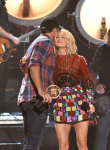 AMERICAN COUNTRY COUNTDOWN AWARDS: Carrie Underwood presents the Male Artist Of The Year award to Luke Bryan on the AMERICAN COUNTRY COUNTDOWN AWARDS LIVE from the “Fabulous” Forum in Inglewood, CA on Sunday, May 1 (8:00-10:00 PM ET live/PT tape-delayed) on FOX. CR: Michael Becker/FOX © 2016 FOX BROADCASTING CO.