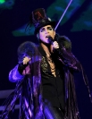 Singer Adam Lambert performs onstage during his "Glam Nation 2010 Tour' at Club Nokia on December 16, 2010 in Los Angeles, California.
